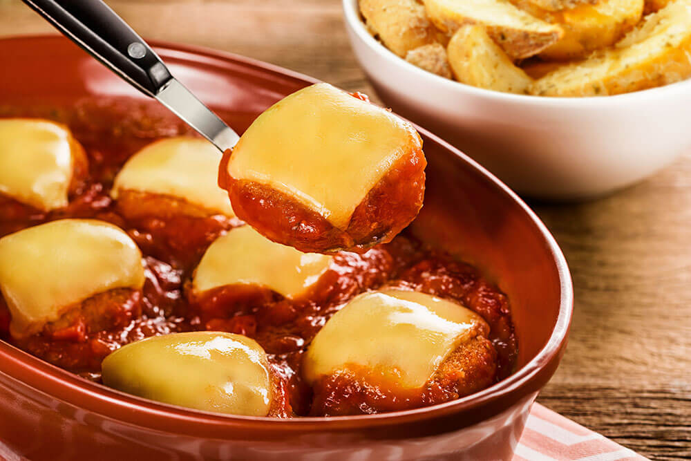 Mignon suíno à parmegiana